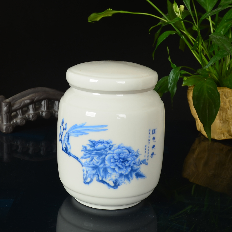 The New rotating honey pot of blue and white porcelain ceramic paste pot POTS with cover retro nostalgia seal storage small vases