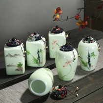 Xinyun hand-painted celadon tea jar Ceramic jar Wooden stopper sealed jar Storage box Large medium and small wake-up tea jar