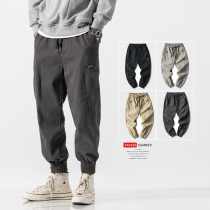 Small feet casual pants slim long pants Korean version of the trend closing pants overalls mens fashion brand autumn and winter plus velvet tie pants