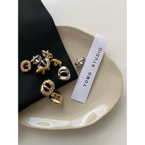 YOMOSTUDIO 2021 Fashion new irregular metal button hollowed-out shirt open-shirt 100 buckle