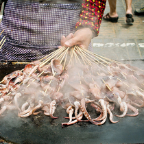 Frozen squid skewers squid head iron plate barbecue squid claws squid head semi-finished ingredients BBQ20 skewers