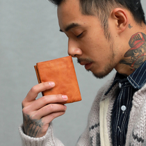 Lao Nius ultra-thin Japanese old handmade wallet mens short youth Japanese retro vegetable tanned cowhide wallet women