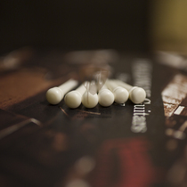 Dalian log Hall ox bone string nail string string cone without inlay DIY essentials on sale