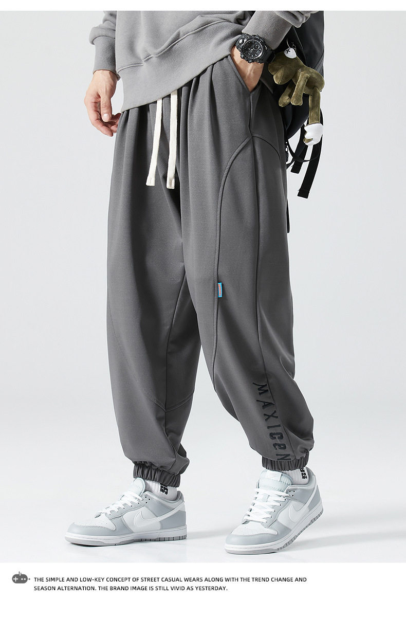 男士大码运动裤男弹力宽松束脚哈伦裤胖子休闲裤加肥加大码卫裤潮