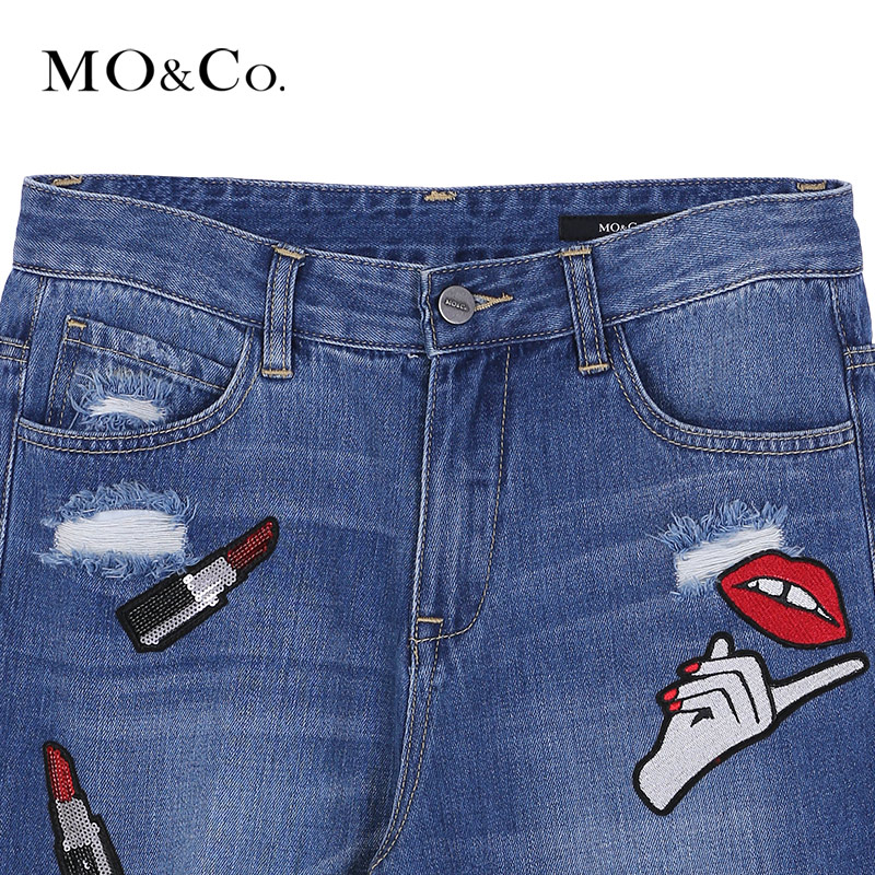 MO&Co.牛仔裤女铅笔裤破洞2015欧美新款丹宁波普绣章趣味长裤moco产品展示图2