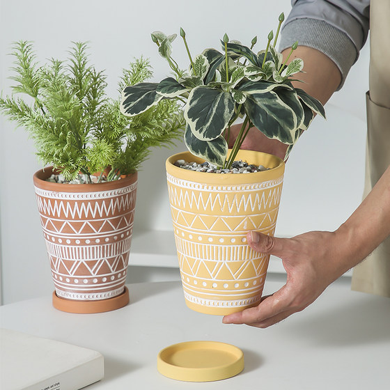 Ceramic flower pot tall and round old retro totem elements breathable and absorbent vegetarian green plants and flowers decorative ceramic pot
Ceramic flower pot tall and round old retro totem elements breathable and absorbent vegetarian green plants and flowers decorative ceramic pot