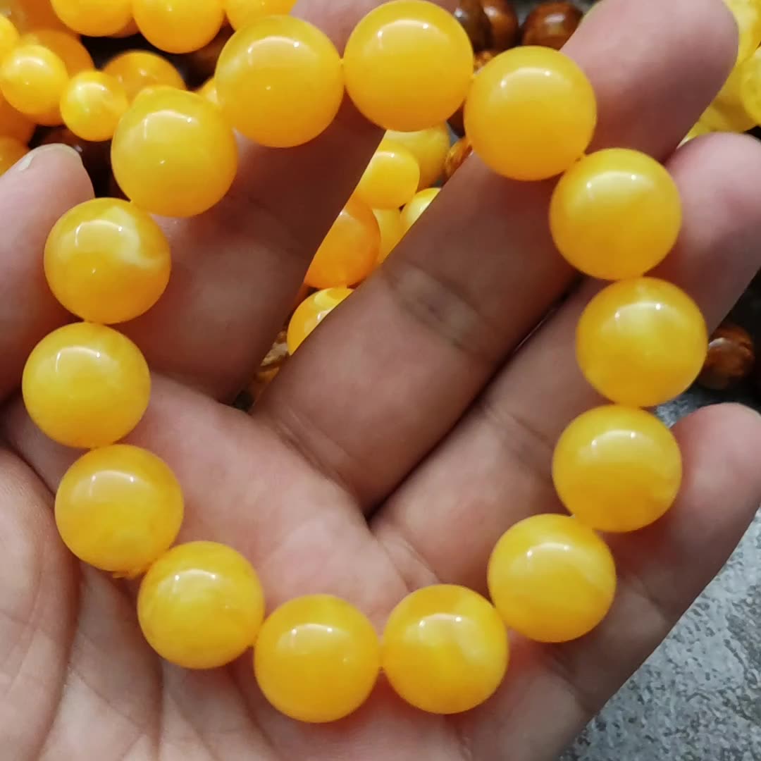 二代琥珀蜜蜡鸡油黄飘花仿蜜蜡色圆珠男女款佛珠手串手链厂家批发