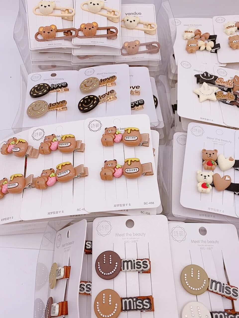 义乌发饰文具2元店头饰品2元店网红混批奶茶咖色卡通对夹发夹b99