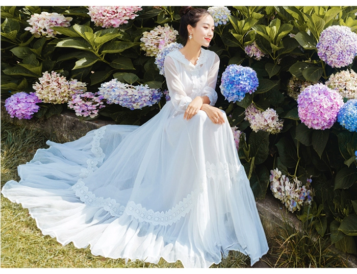 Vân Nam Lệ Giang phong cách dân tộc Tây Tạng quần áo du lịch của phụ nữ voan đỏ xích đu lớn ảnh váy dài lễ phục - Váy dài