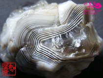 Ruyi fossilized ancient jade country red wind sharpened the stone Manowen to play with the stone