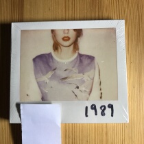 Taylor Swift records sales of 1989 new unopened polaroid spot