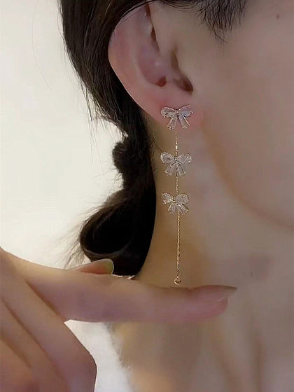Tassel Long Zircon Bow Earring for Women 2025 New Trendy Light Luxury 고급 절묘한 얼굴 쇼 작은 귀걸이 Tassel Long Zircon Bow Earring for Women 2025 New Trendy Light Luxury 고급 절묘한 얼굴 쇼 작은 귀걸이