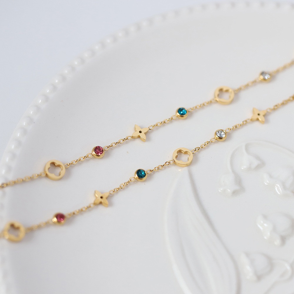 老钱风彩钻四叶花 轻奢镂空花朵唯美手链 钛钢镀18k金跨境