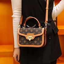 French DUDK womens bag foreign style 2021 new trend retro niche design fashion wild messenger small square bag