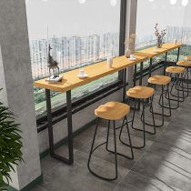 Milk tea shop bar long table against the wall high table backed by bar chair Simple solid wood bar table table and chair combination