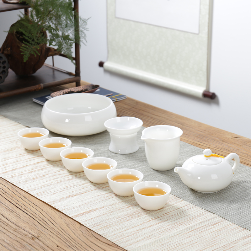 White porcelain kung fu tea set jade suit dehua porcelain teapot teacup of a complete set of ceramic filter tureen tea to wash to the home office