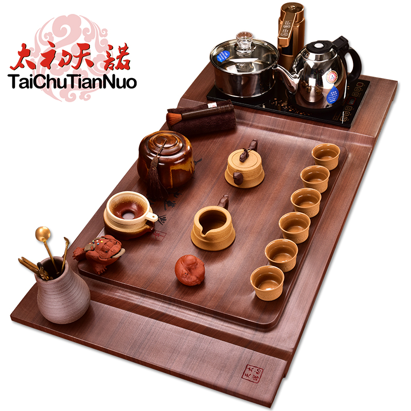 The beginning day, stone tea tray was four one red TanShi tea tea set live purple sand pottery kung fu tea furnace