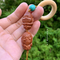 (Little monster pair of handpieces) niche personality cute olive core carving text play handlebar pendant gift