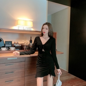 Nightclub temperament shows thin， low chest and buttock skirt with hollow long sleeve Tight Sexy Dress