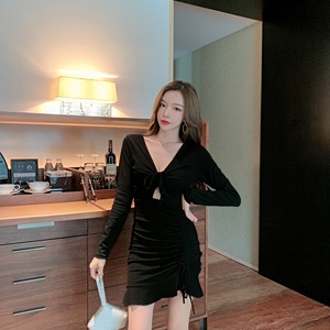 Nightclub temperament shows thin， low chest and buttock skirt with hollow long sleeve Tight Sexy Dress