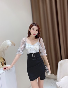 Sexy V-neck low chest thin and irregular lace patchwork hip pack dress