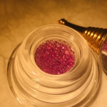 Shakyamuni Buddhas top Wheel Symphony Lotus seed A bottle of rose powder infinitely proliferate and grow up for the Stupa