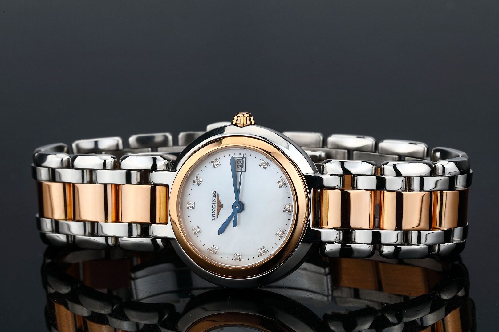 3折9.8新浪琴心月18k玫瑰金原镶时标钻石英女表l8.110.5.87.