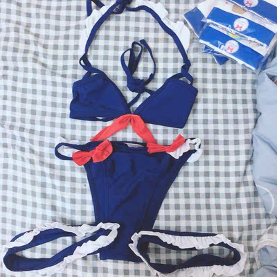 手感和质量都超好！好像是泳衣材质 很软很滑的那种！白色花边被红色蝴蝶结染了一丢丢色 不过又不穿出去所以不影响 还有就是对胸小的胖子很不友好！！L码的胖次咱都穿不上去...好紧 胖萝哭晕在厕所里...束腿环和胖次连在一起的不太好穿就擅自剪掉了 就不放图了太胖怕被喷_(&brvbar;3」&ang;)_