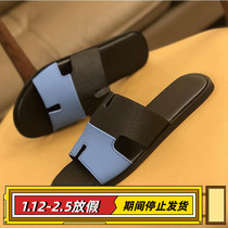 Summer leather one-word slippers mens European station mens 2021 new non-slip all-match outerwear slippers beach sandals