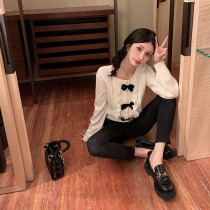 Spring and autumn gentle wind lotus leaf side butterfly knot white sweater jacket woman lazy sleeve head Han version foreign gas easy blouse