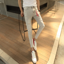Tide spring and summer ankle-length pants mens jeans broken hole leisure new Korean slim feet 9-point pants male students pants
