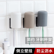 A shelf for toothbrushes a couple of punch-free mouthwash and toothbrushing cups a bathroom wall-mounted toothbrushing storage set and a toothbrush storage set