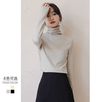 High collar knitted base shirt women 2021 autumn and winter New pile collar slim body fit long sleeve top black and white sweater