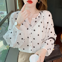 French thin section micro-transparent polka dot long-sleeved shirt womens light and loose single-breasted sunscreen cardigan age-reducing chiffon top
