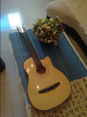 如何评价红棉吉他怎么样，好不好用？Kapok红棉民谣吉他真的不好吗？