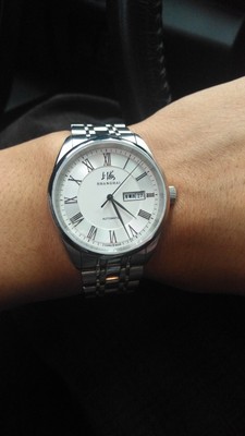 解说男生戴上海手表怎么样,这个牌子上档次吗?是名牌吗?