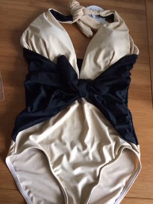 比较满意，谢谢店家还送了一个头饰。美美的可以去旅游下海了。