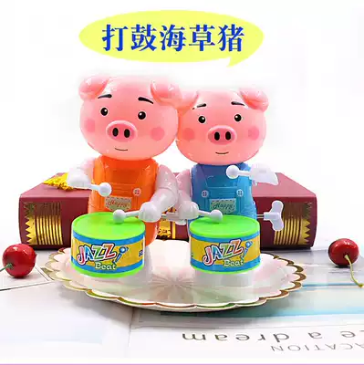 On the chain drumming pig clockwork robot toy cartoon chain toy educational toy playing drum drum drum police