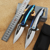 Manipulat mechanical folding knife outdoors with a knife in the field