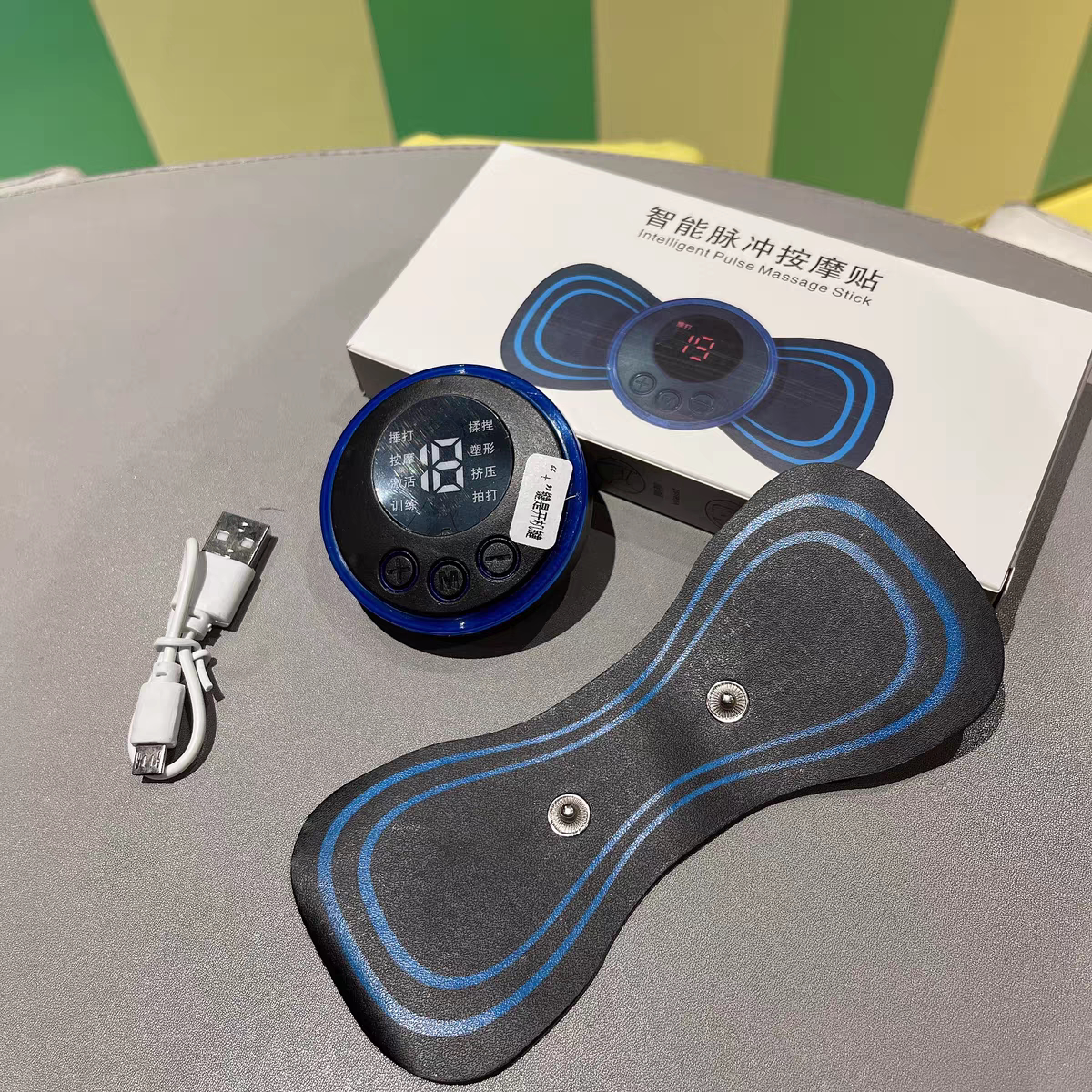 理疗脉冲仪便携mini颈椎按摩仪