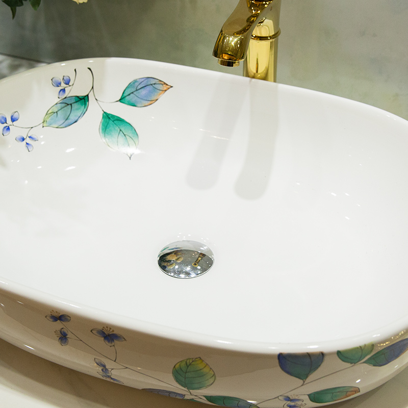 What king of toilet stage basin oval lavatory basin of household ceramic lavabo art hand - made green leaf