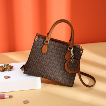 2021 New Hong Kong Tide fashion leather cross bucket bag simple portable shoulder space capsule pet backpack