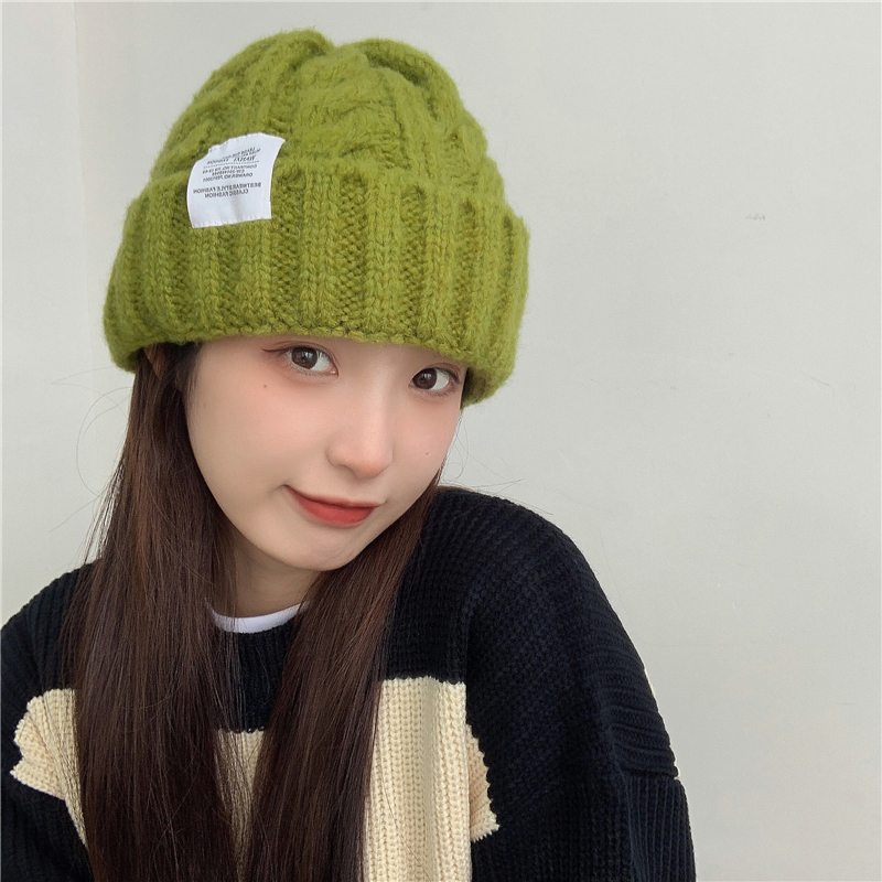 Korea (Designer) Sandro Tarpin Show face small twist knitted hat warm pullover woolen hat