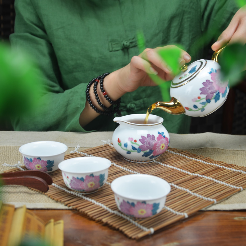 A complete set of new ceramic kung fu tea set under the glaze color hand - made teapot gift six cups of tea