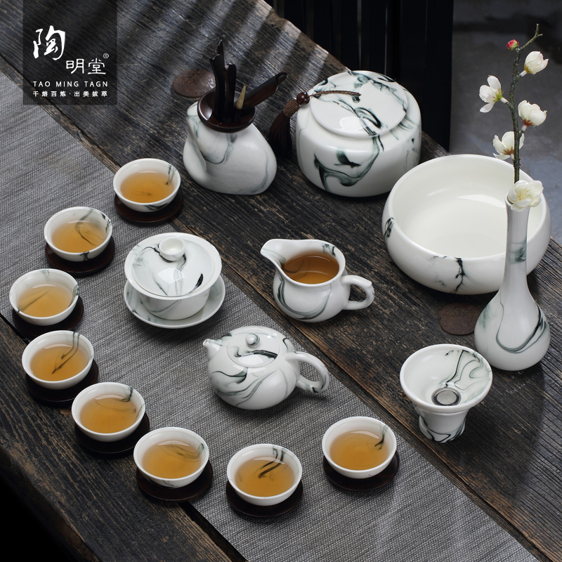 TaoMingTang hand - made kung fu tea set suit household contracted jade porcelain ceramic dehua white porcelain tea set. A complete set of tea cups