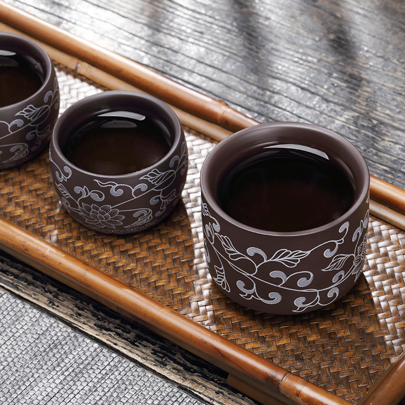 TaoMingTang violet arenaceous kung fu tea set suit household ceramic tea cup tea tea is a complete set of manually