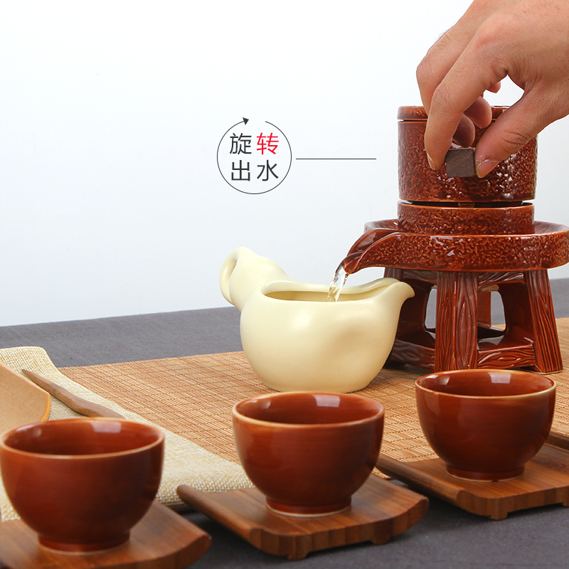 TaoMingTang tea set household automatic restoring ancient ways of a complete set of creative stone mill ceramic kung fu tea set lazy people prevent hot