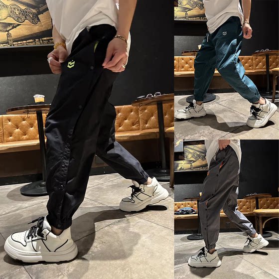 Autumn new buttons and net couples tie-up casual pants trendy and fashionable versatile workwear small feet sports harem pants
Autumn new buttons and net couples tie-up casual pants trendy and fashionable versatile workwear small feet sports harem pants