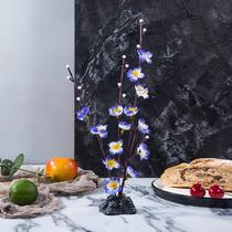 Shaped ornaments fake flowers restaurant set up dishes bright stalls fish and sashimi dishes decorated with flowers and plants colddish dishes