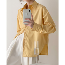 Salt shirt women 2021 new design sense Korean yellow loose irregular long sleeve shirt shirt women fold wear